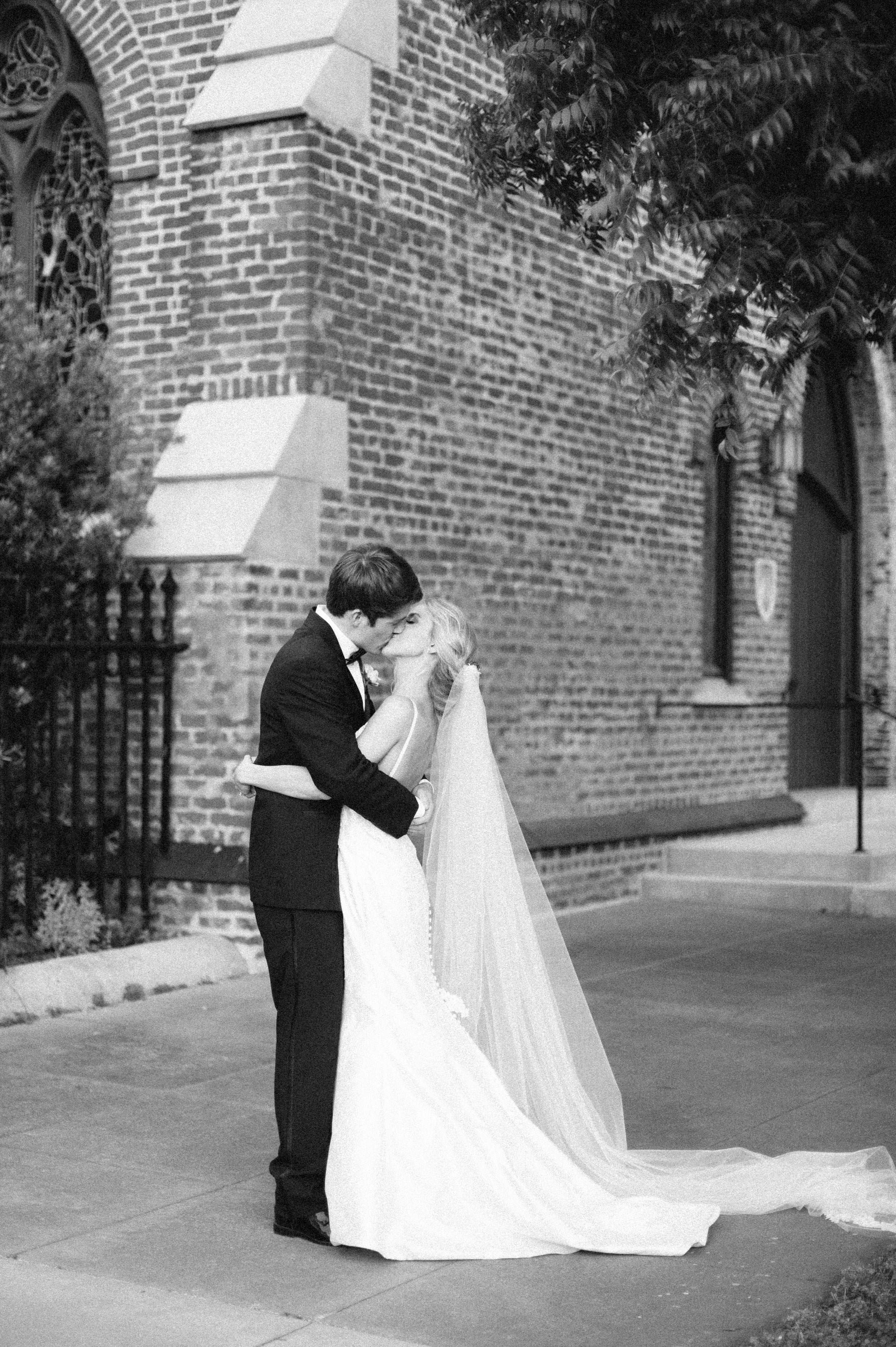 Bride and groom kissing at Selma, AL wedding