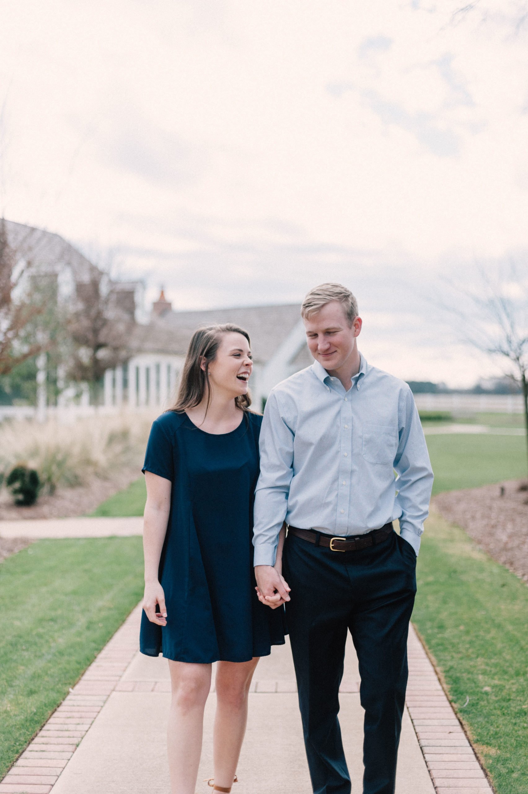 Cute engagement photos of couple laughing at Hamilton Place Pursell Farms in Sylacauga AL