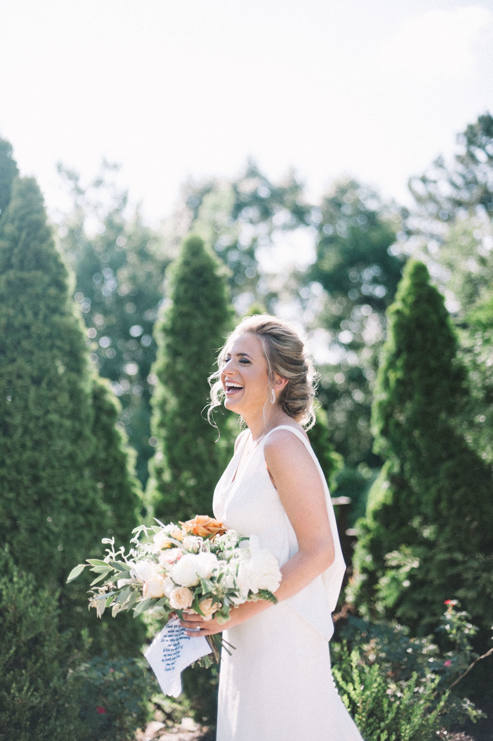 Hoover AL bride posing in garden by Olivia Joy Photography