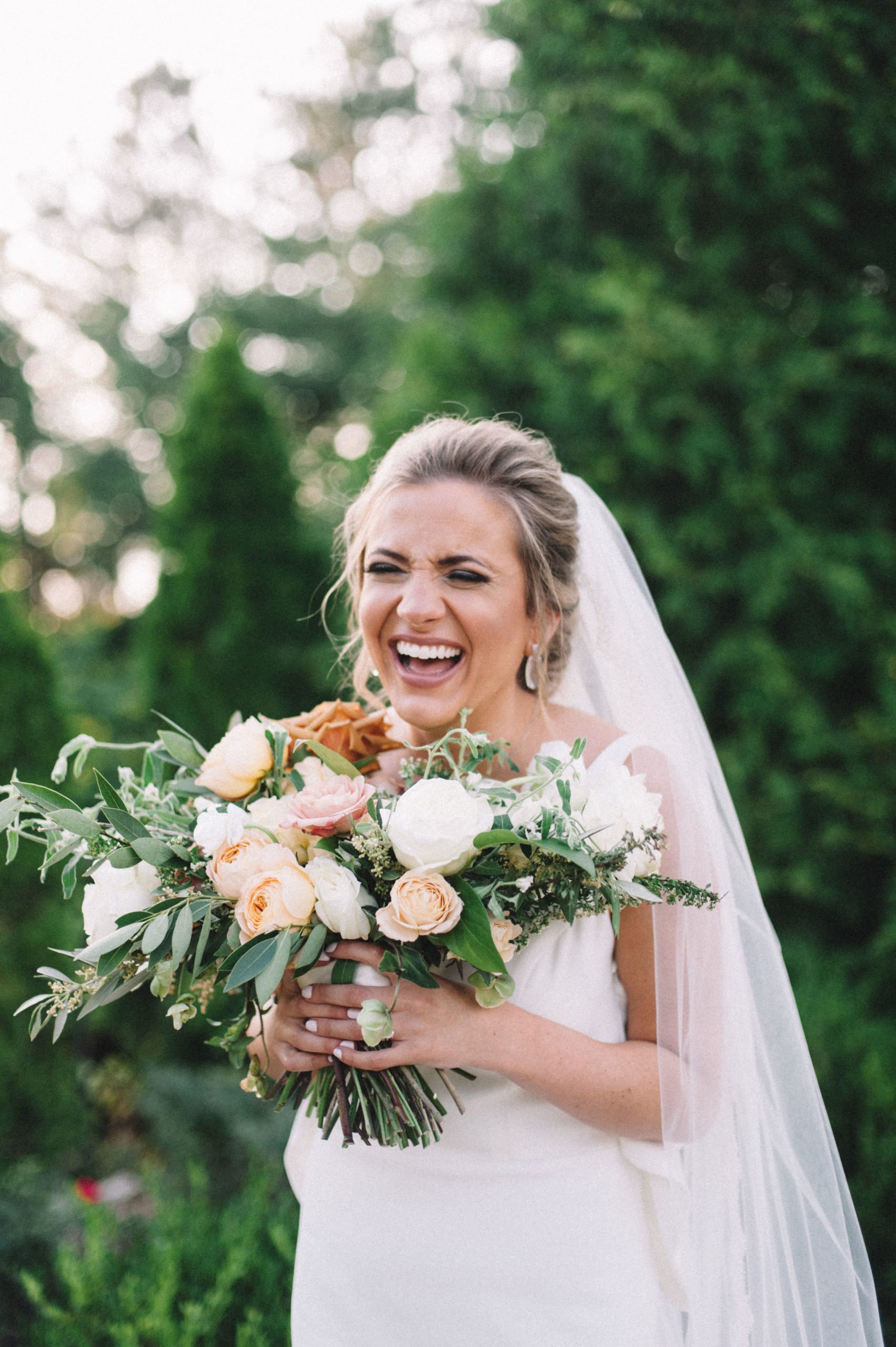 Hoover AL bride smiling with bouquet by Olivia Joy Photography