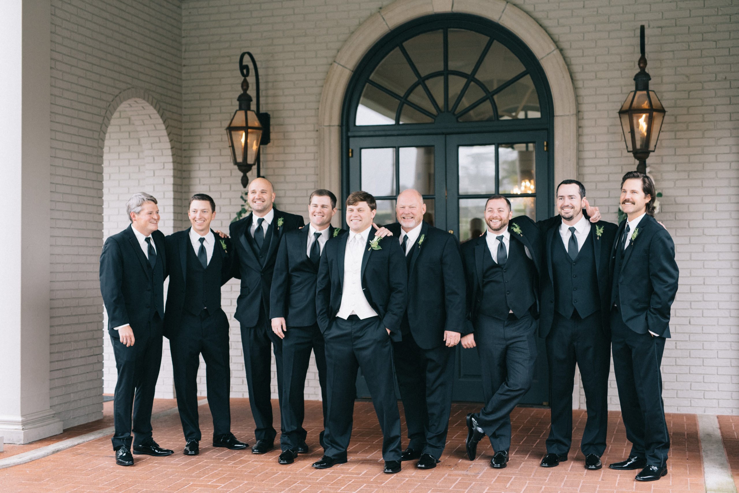 Groom posing with groomsmen before Vestavia Hills Country Club wedding