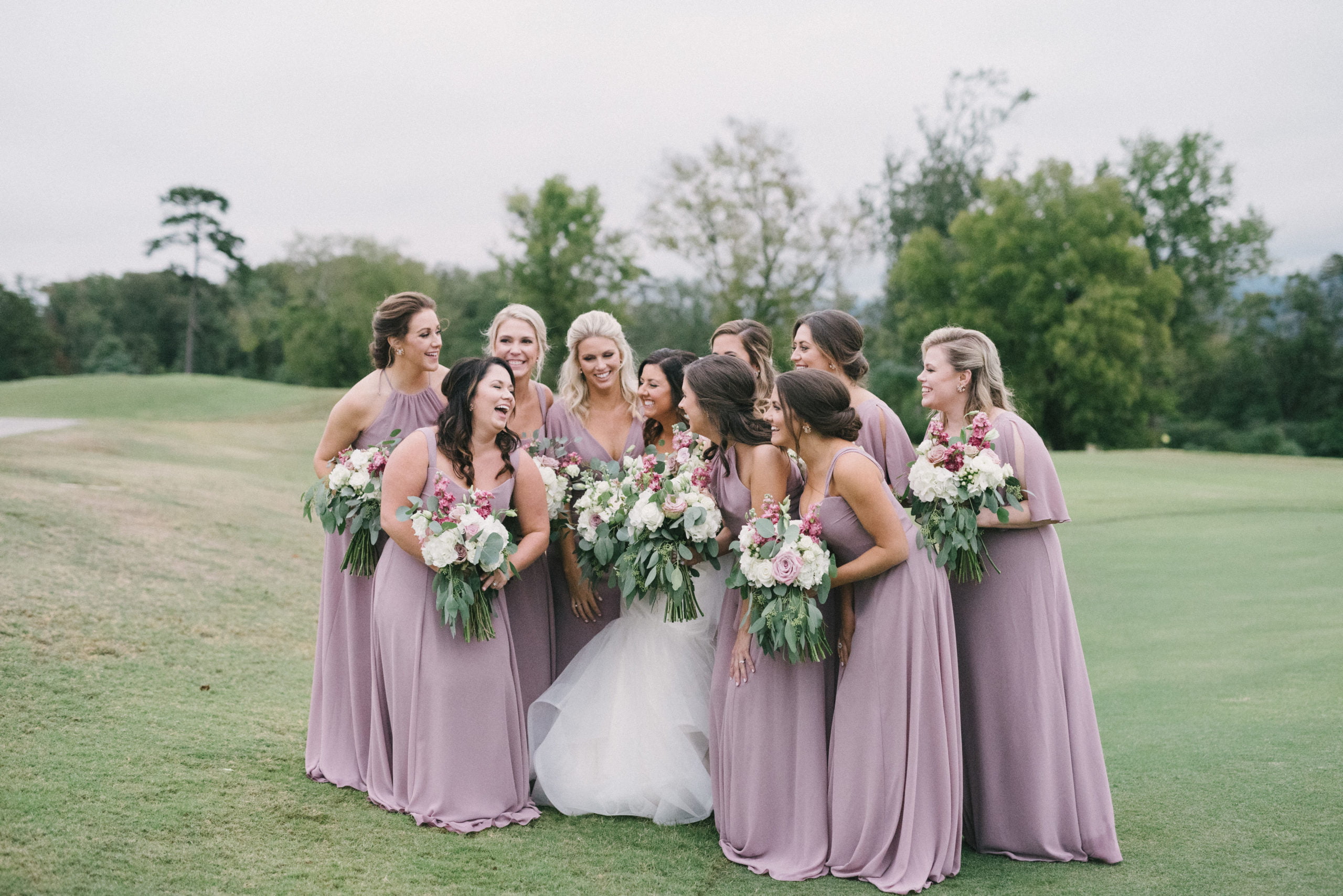 Vestavia Hills AL bride and bridesmaids posing with bouquets by Olivia Joy Photography