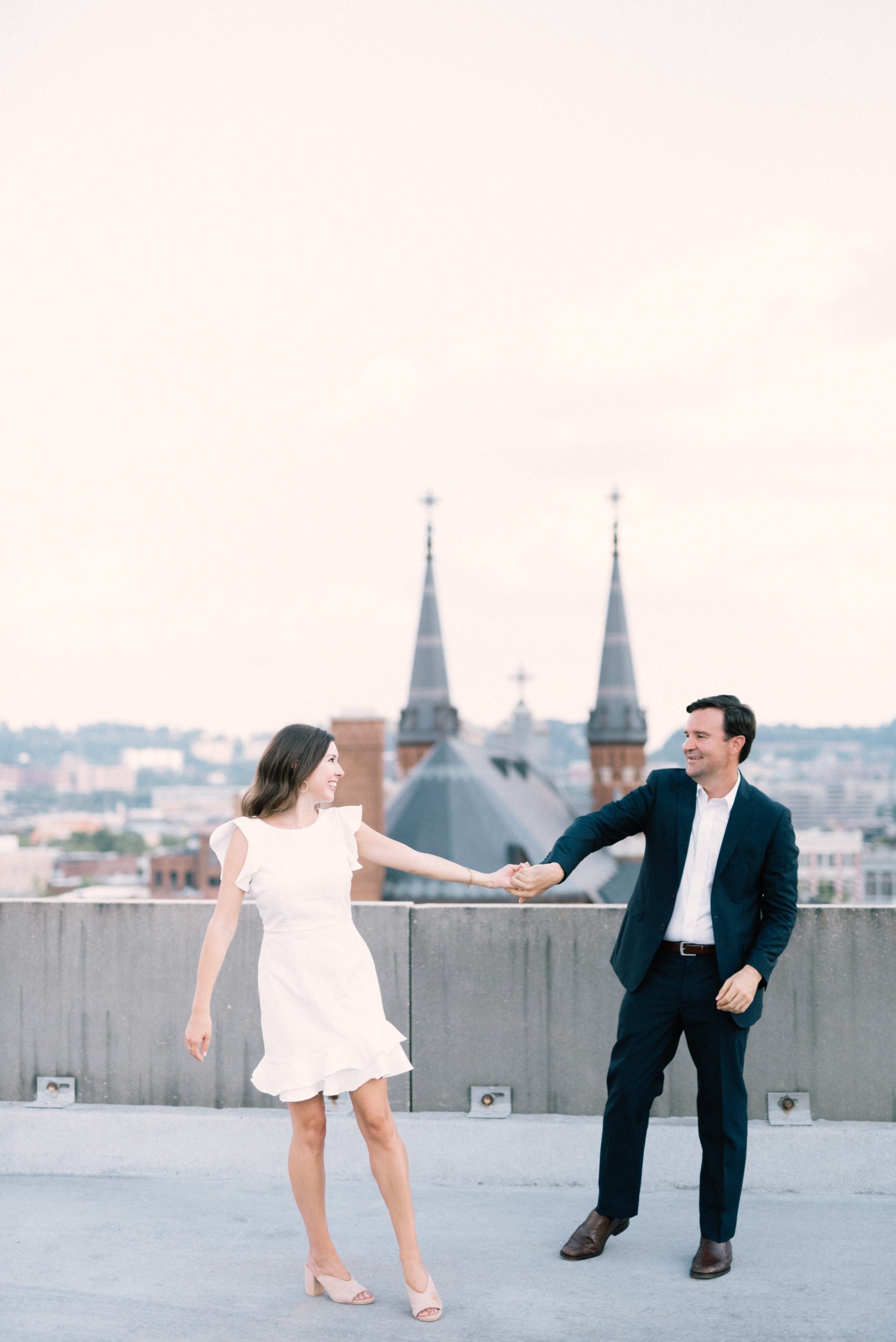 Dancing engagement session photos in front of St Paul's Cathedral in Birmingham AL
