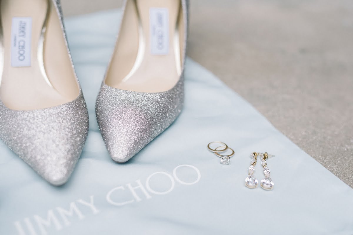 Shoes by Jimmy Choo, wedding ring and earrings