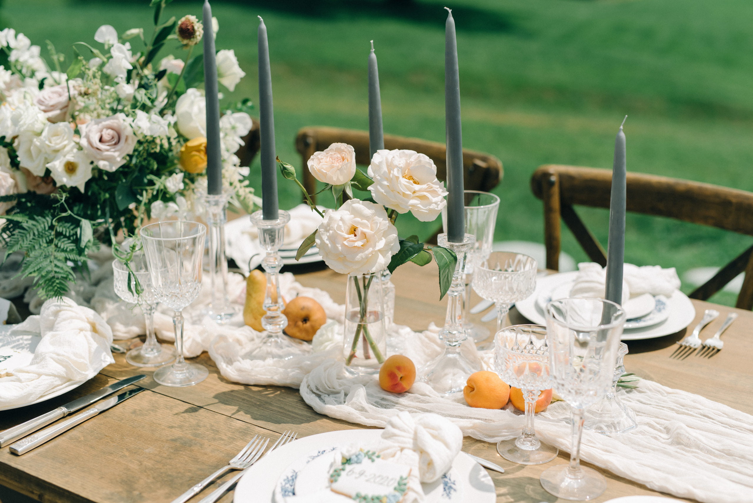 A beautiful fruit-filled tablescape for a fine art style wedding