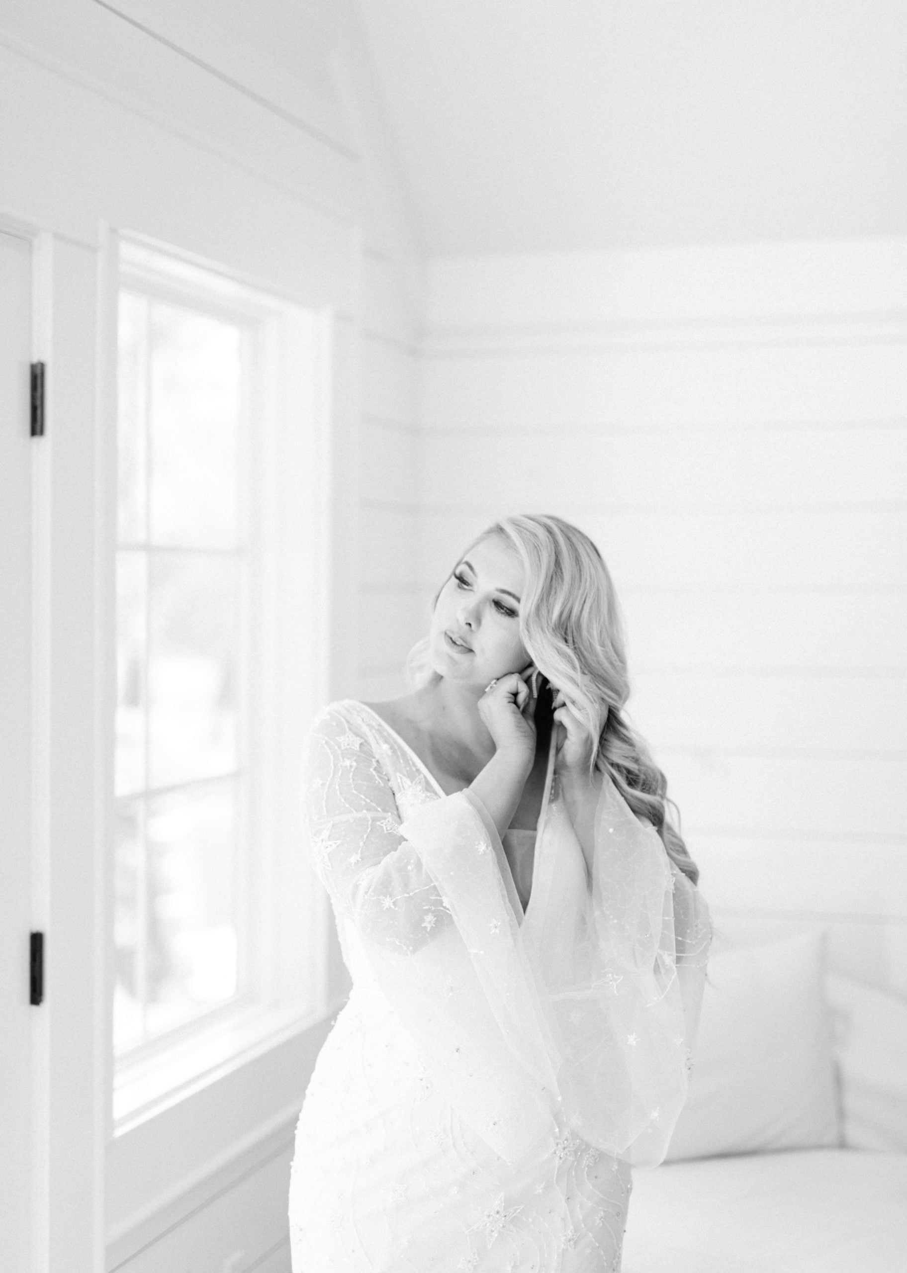 A bride getting ready on her wedding day at Oak Meadow Event Center in Alabama