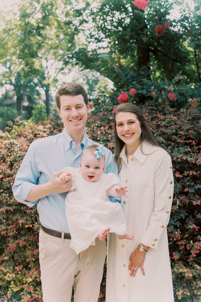 A beautiful happy and smiling family portrait outside in Birmingham, AL